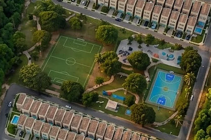 Render del corazón de amenidades de Perlas 3: cancha de fútbol, cancha de usos múltiples y juegos infantiles